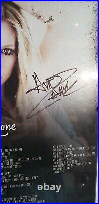In person signed/autographed album cover poster of Avril Lavigne
