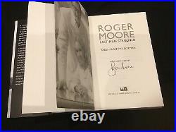 Last Man Standing Book Signed By Roger Moore in Person In 2014