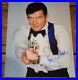 Roger_Moore_Hand_Signed_Photograph_4_In_Person_Uacc_Dealer_The_Saint_James_Bond_01_uipb