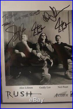 Rush signed 8x10 Promo Photo! Neil signed 2 times! In person